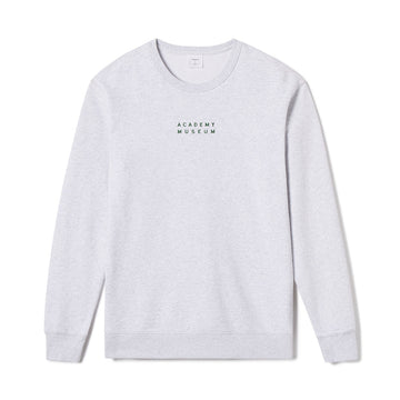 Gray long-sleeve shirt with 'Academy Museum' logo on a white background